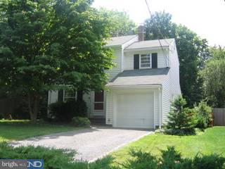 20 Jefferson Road Princeton, NJ 08540 - Photo 1 of 6 a front view of a house with a yard and garage