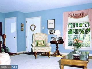 20 Jefferson Road Princeton, NJ 08540 - Photo 6 of 6 a living room with furniture a rug and a large window