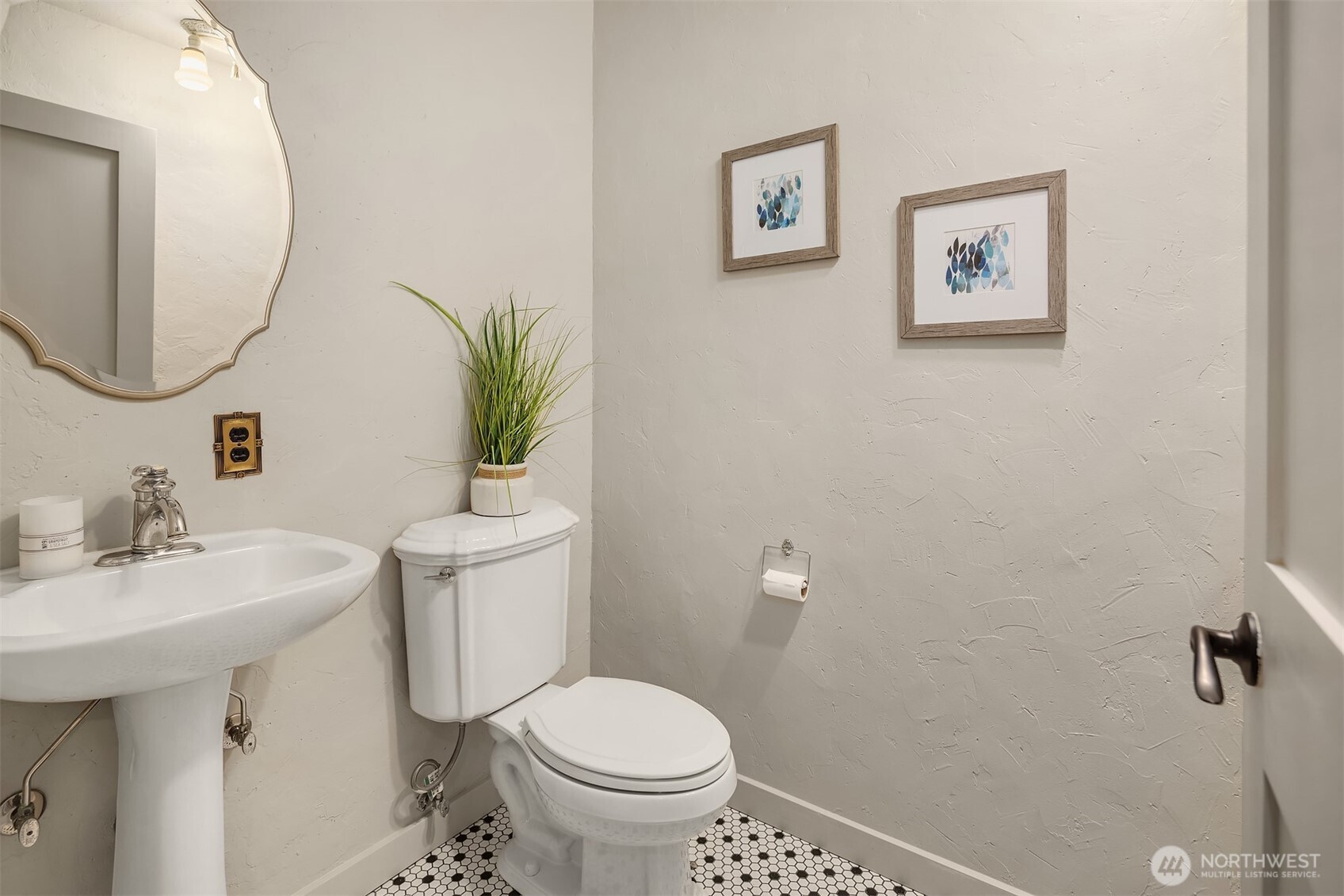 41715 Southeast 101st Street North Bend, WA 98045 - Photo 13 of 38 a bathroom with a toilet sink and mirror