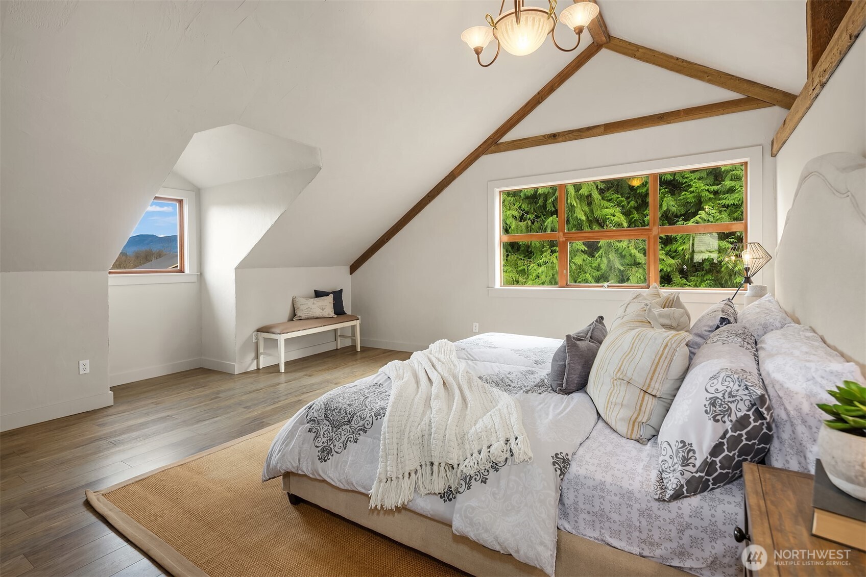 41715 Southeast 101st Street North Bend, WA 98045 - Photo 14 of 38 a bedroom with a bed and window