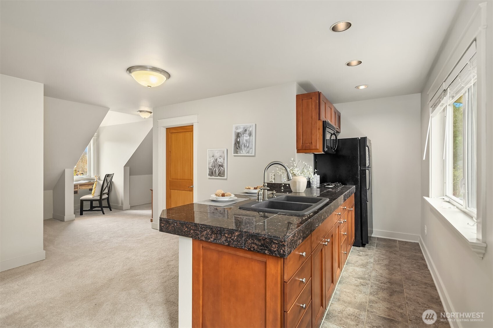 41715 Southeast 101st Street North Bend, WA 98045 - Photo 25 of 38 a kitchen with stainless steel appliances granite countertop a sink stove and cabinets