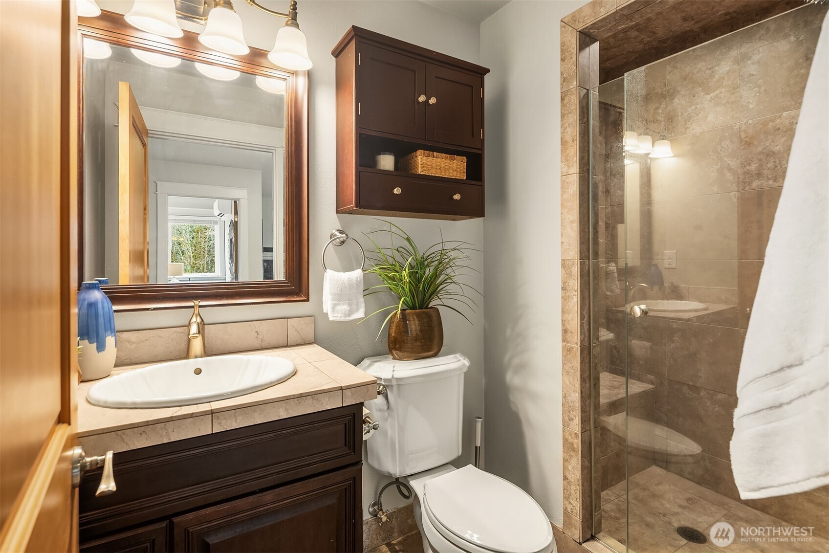 41715 Southeast 101st Street North Bend, WA 98045 - Photo 30 of 38 a bathroom with a sink a toilet and shower