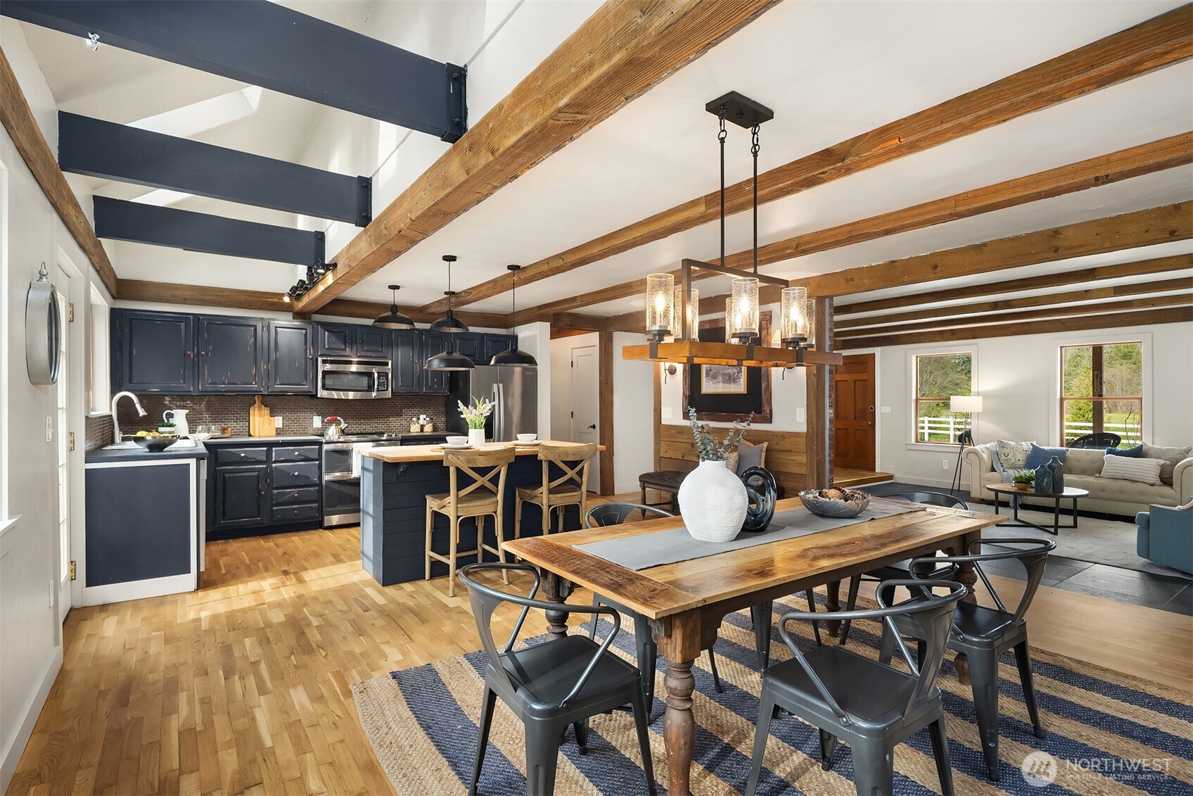 41715 Southeast 101st Street North Bend, WA 98045 - Photo 9 of 38 a kitchen with a table and chairs in it