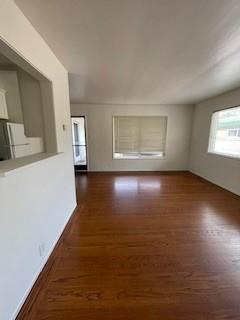 1956 Ivy Street, Unit 3 San Mateo, CA 94403 - Photo 3 of 8 a view of a livingroom with wooden floor