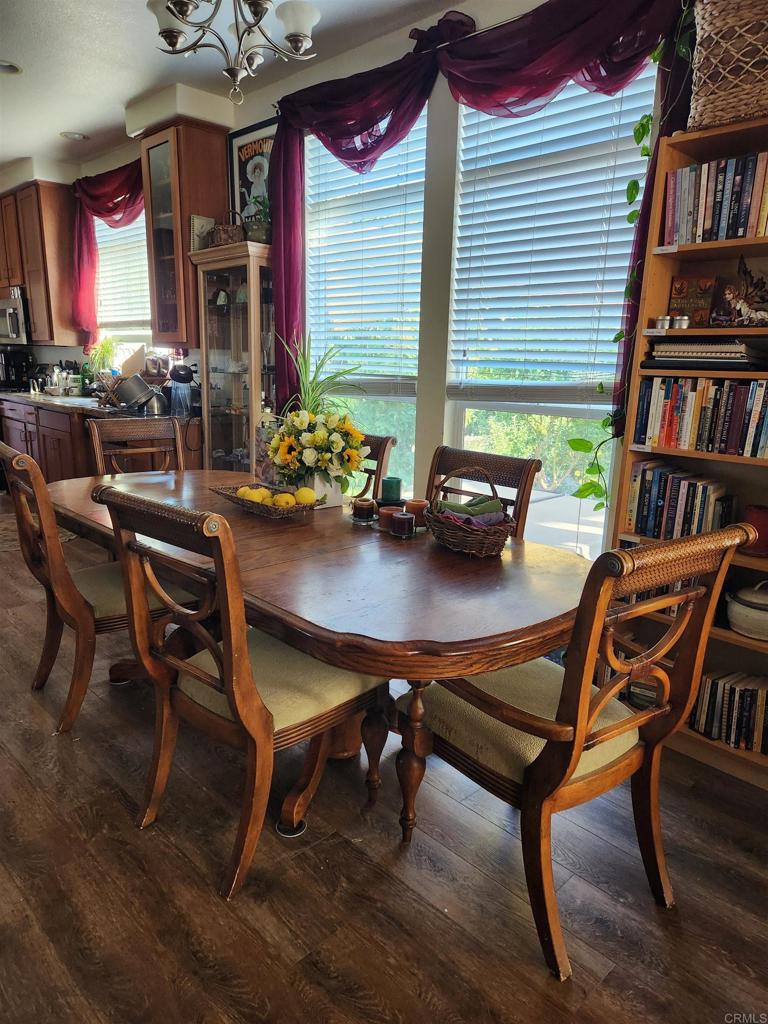 3909 Reche Road, Unit 30 Fallbrook, CA 92028 - Photo 3 of 52 a room with furniture and a bookshelf