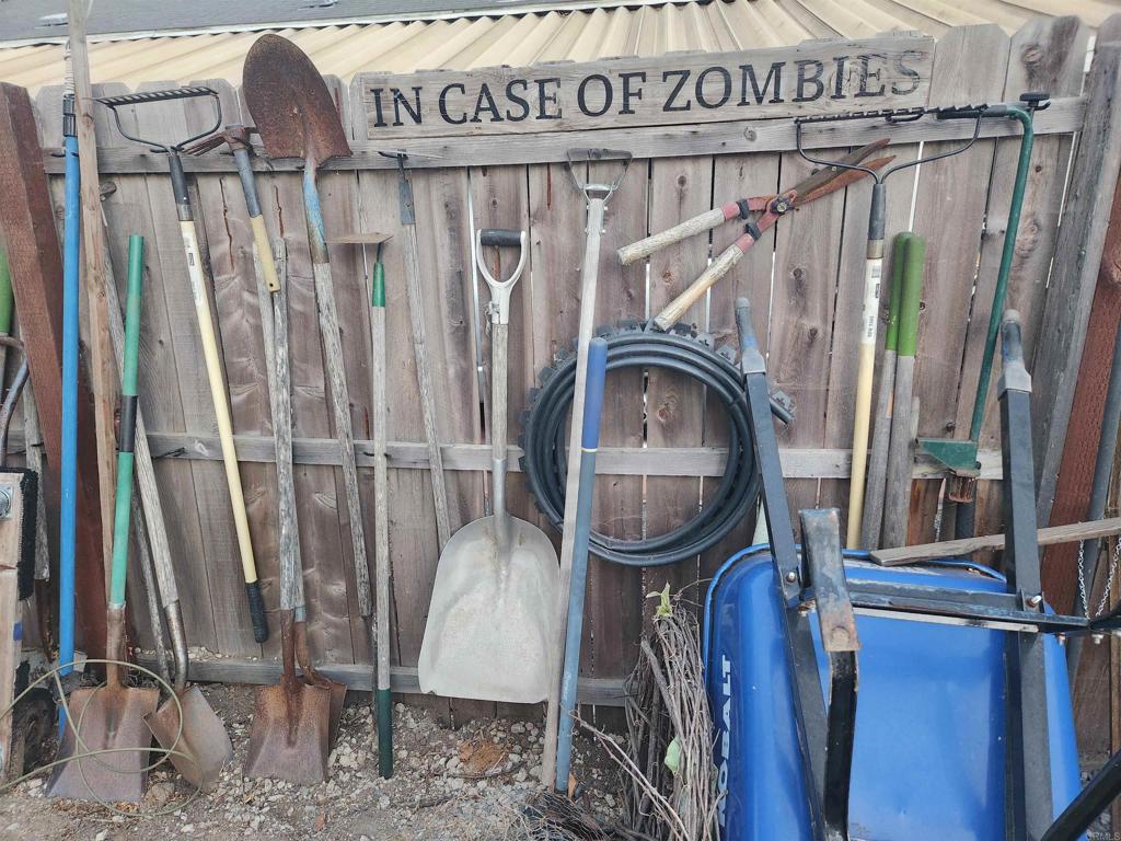 3909 Reche Road, Unit 30 Fallbrook, CA 92028 - Photo 31 of 52 a front view of a house with wooden floor and stairs
