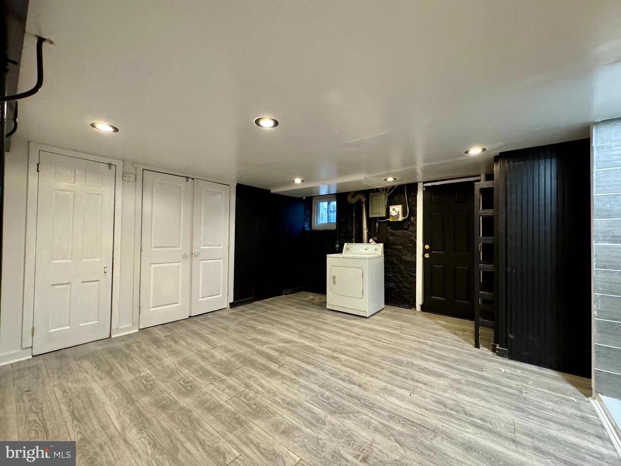 3704 Delverne Road Baltimore, MD 21218 - Photo 11 of 20 a view of a big room with closet and a bathroom