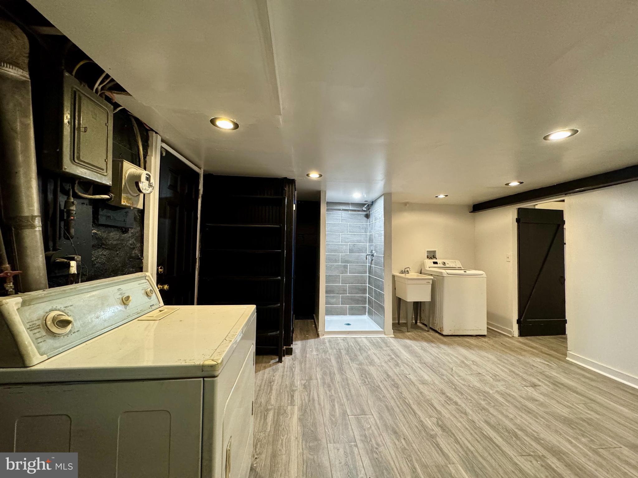 3704 Delverne Road Baltimore, MD 21218 - Photo 12 of 20 a room with a refrigerator and a sink