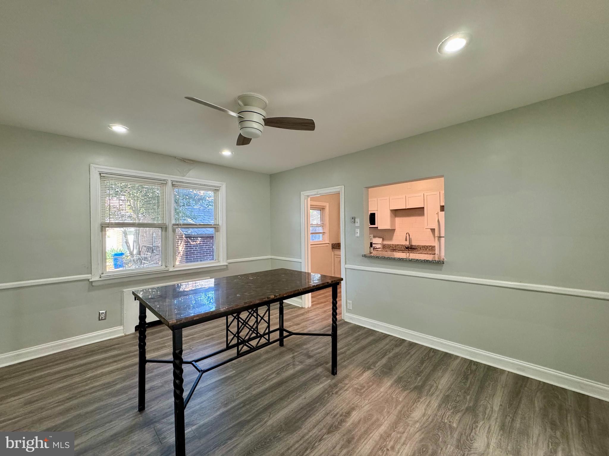 3704 Delverne Road Baltimore, MD 21218 - Photo 4 of 20 a workspace with wooden floor