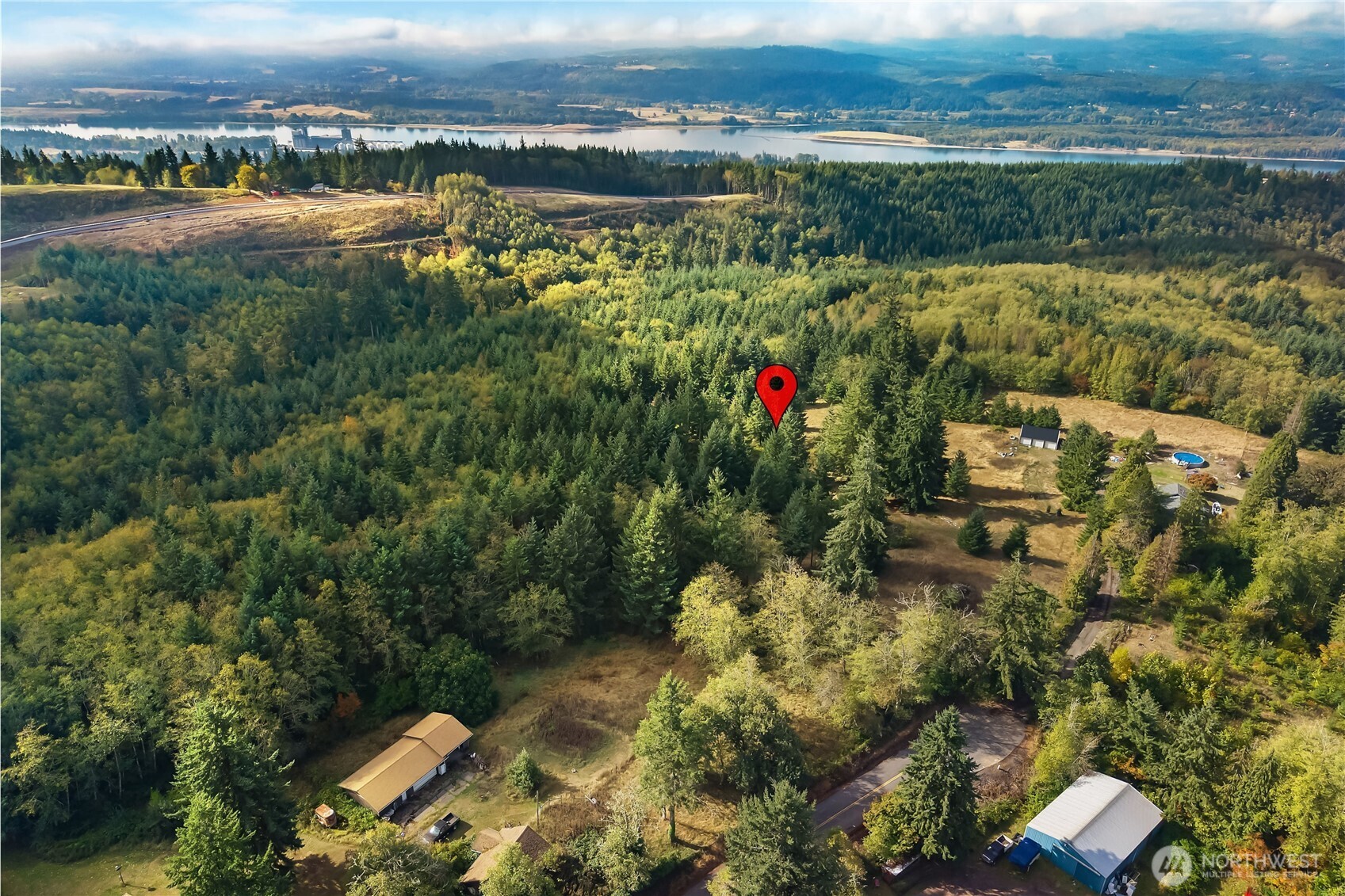 0 Rogers Road, Unit 1 Kalama, WA 98625 - Photo 2 of 10 an aerial view of a houses with a lake view