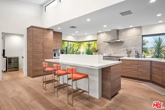 a bathroom with a tub and shower