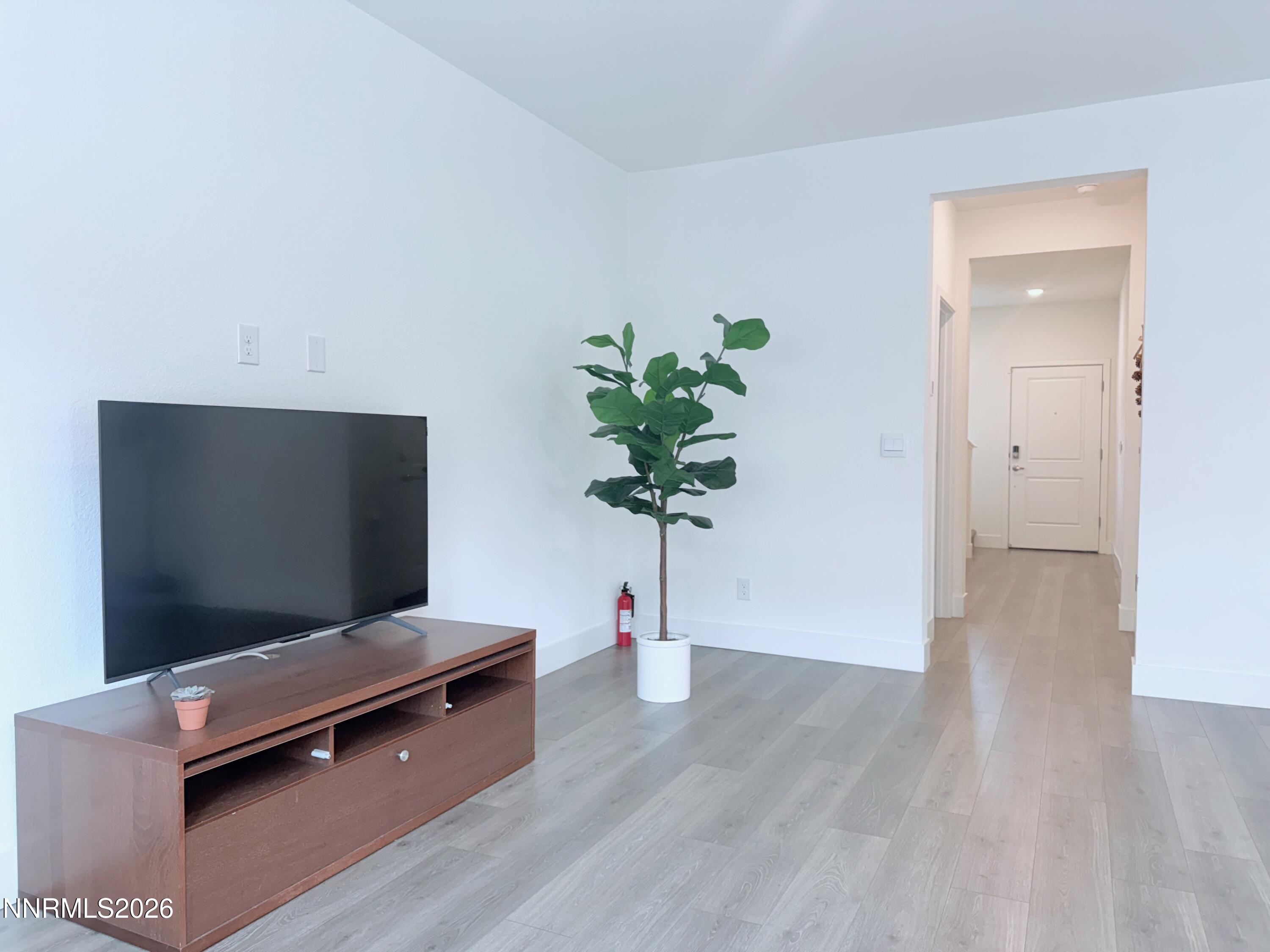 1433 Solitude Trail Reno, NV 89523 - Photo 11 of 35 a living room with furniture pool table and a potted plant