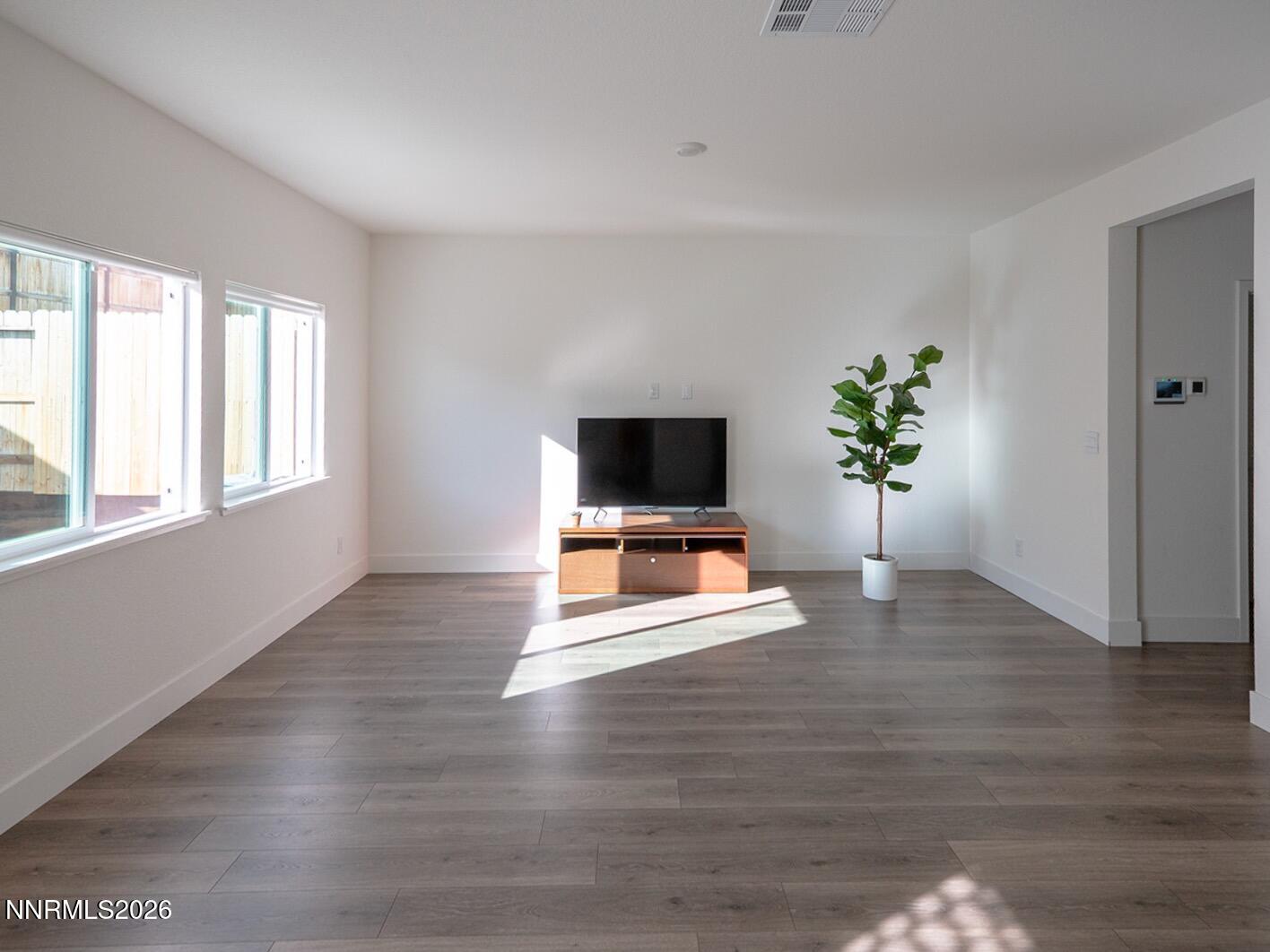 1433 Solitude Trail Reno, NV 89523 - Photo 12 of 35 a living room with furniture and a flat screen tv