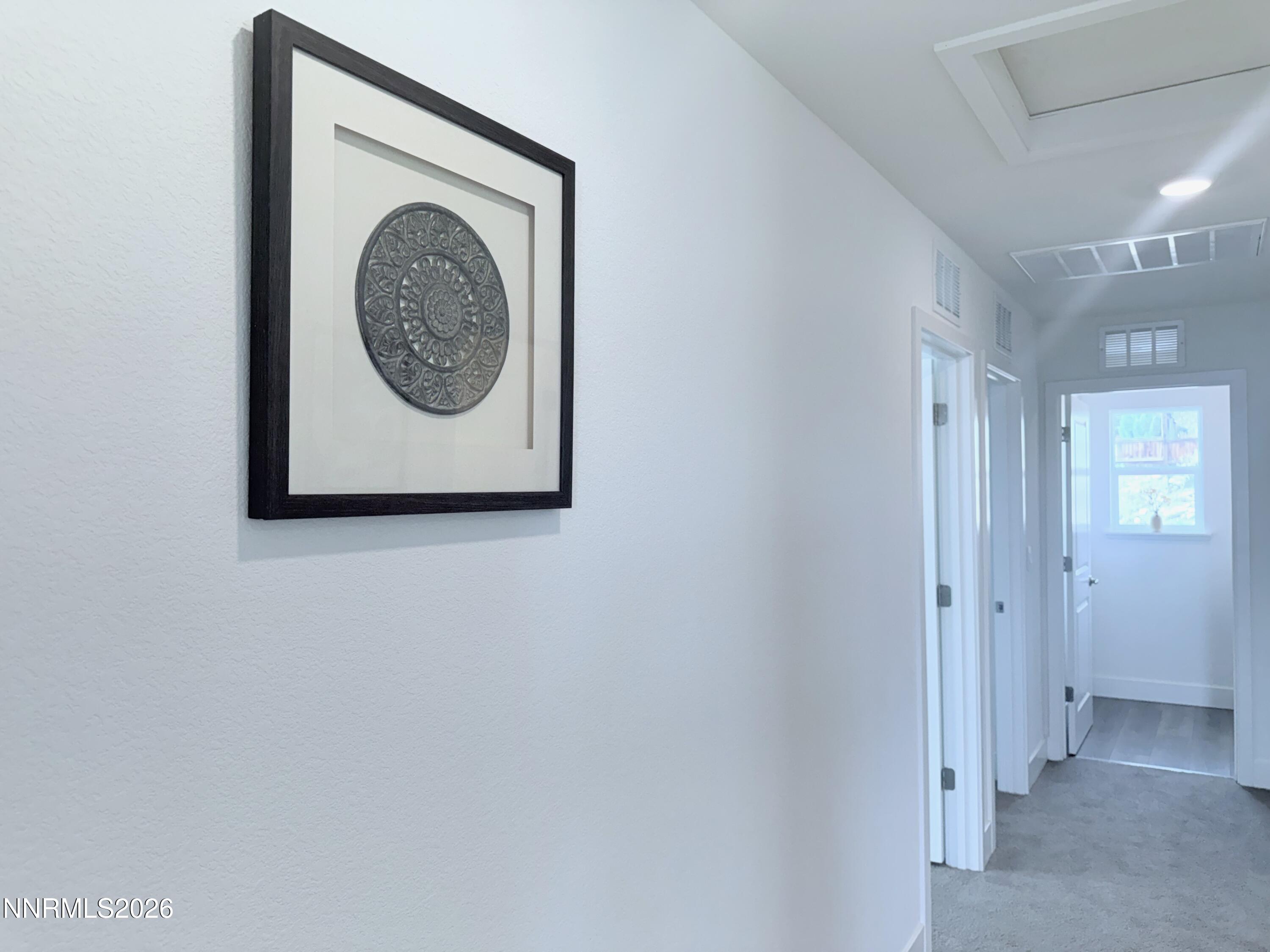 1433 Solitude Trail Reno, NV 89523 - Photo 19 of 35 a view of a hallway with washer and dryer