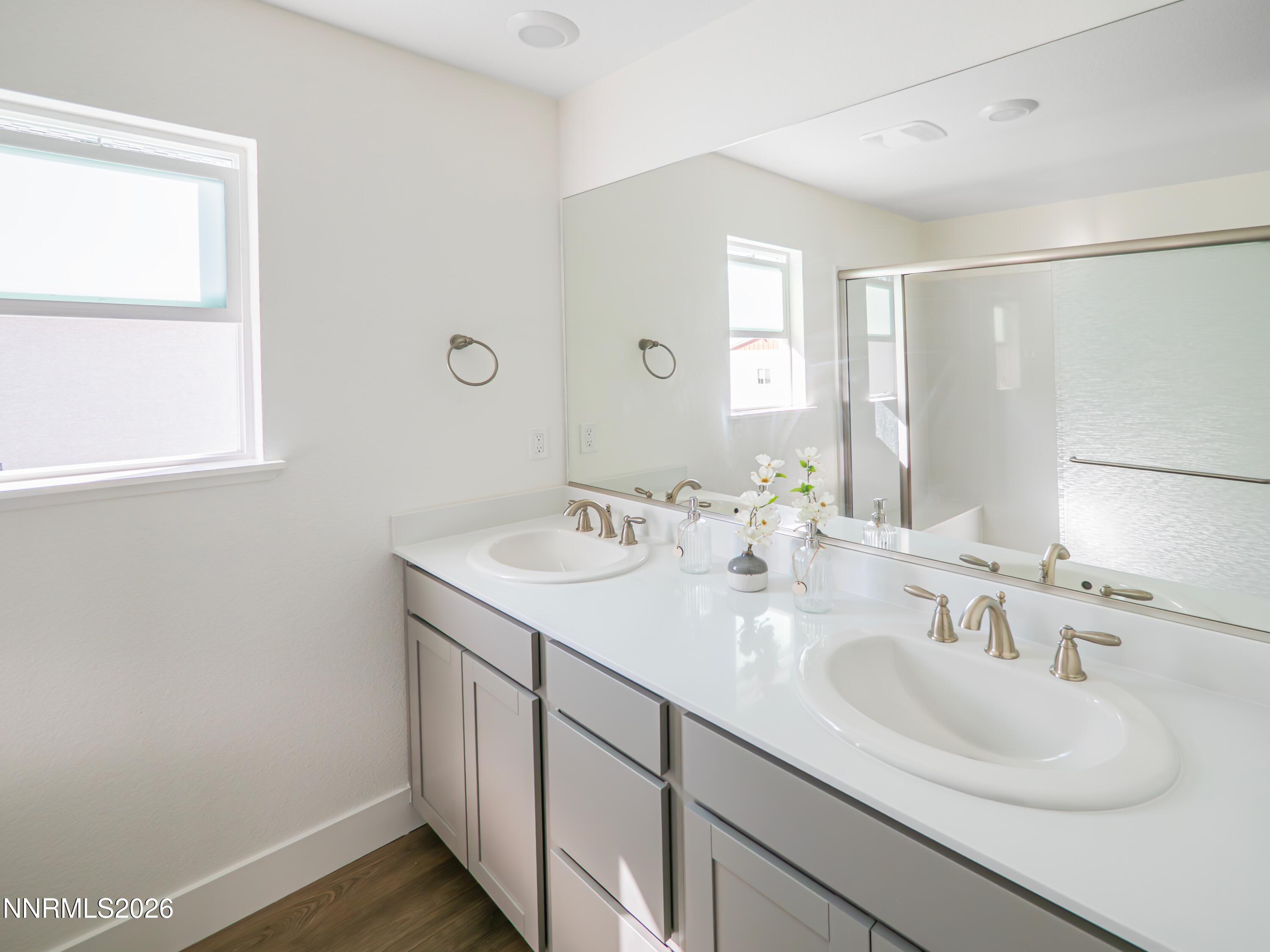 1433 Solitude Trail Reno, NV 89523 - Photo 21 of 35 a bathroom with a sink double vanity and a mirror