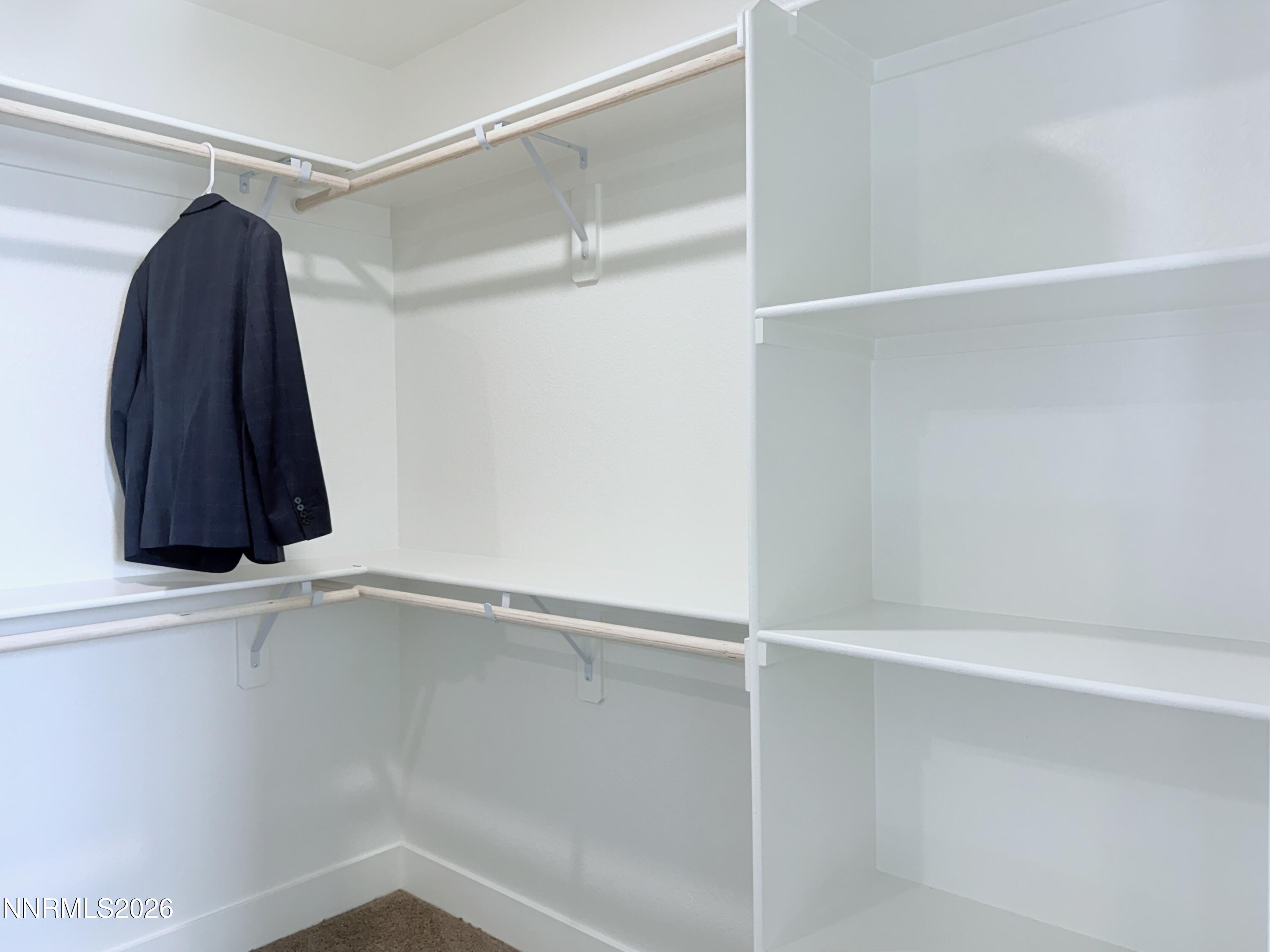 1433 Solitude Trail Reno, NV 89523 - Photo 24 of 35 a view of walk in closet with clothes