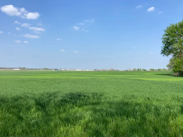 a view of street with sitting area
