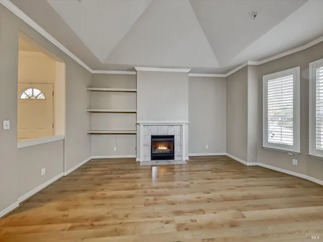 a view of a room that has a fireplace in it
