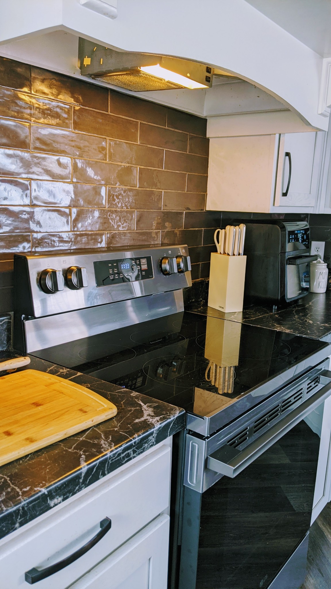 531 Pea Ridge Road Chestnut Mound, TN 38552 - Photo 43 of 91 a stove top oven sitting inside of a kitchen
