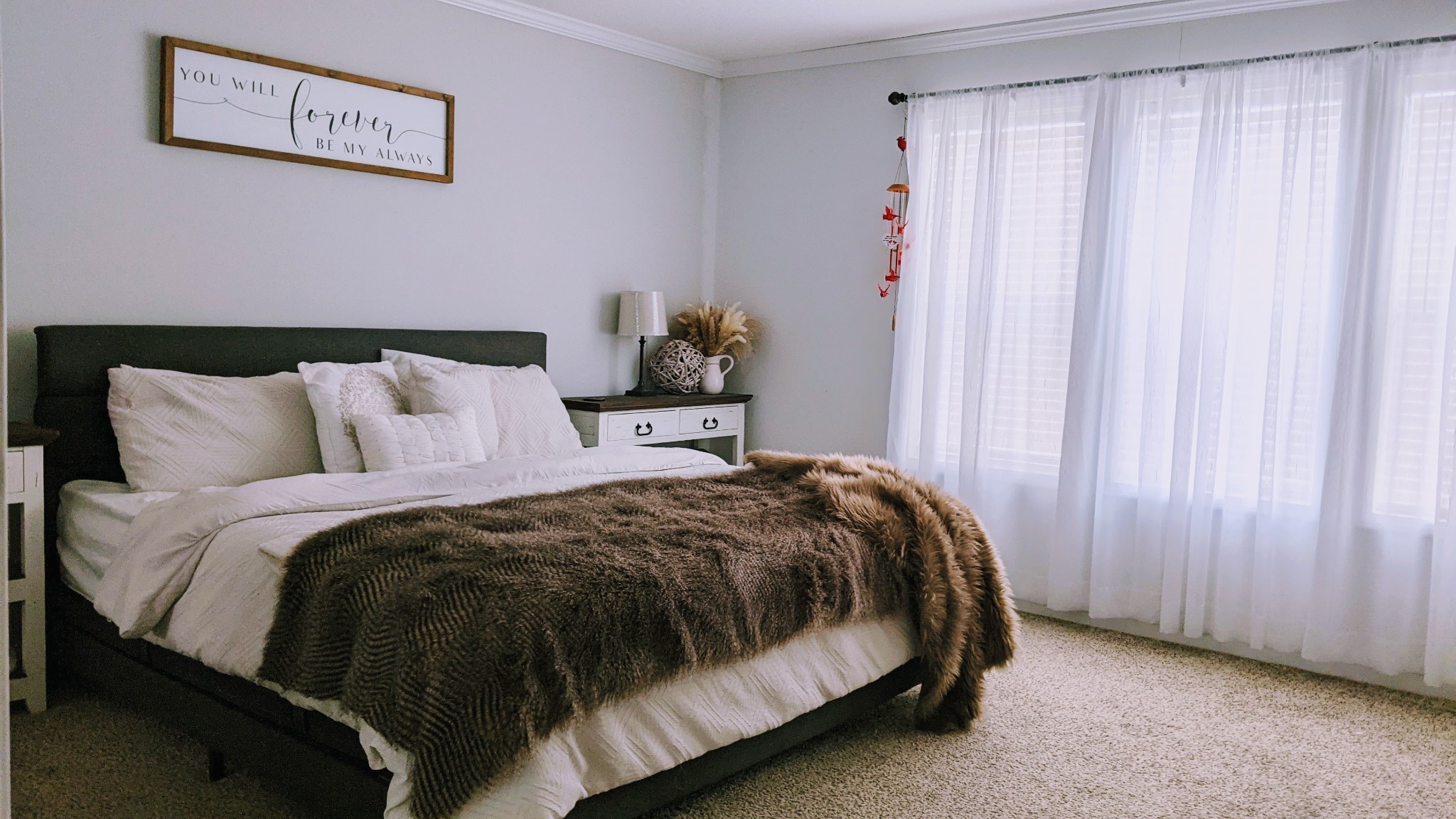 531 Pea Ridge Road Chestnut Mound, TN 38552 - Photo 46 of 91 a bed sitting in a bedroom next to a window