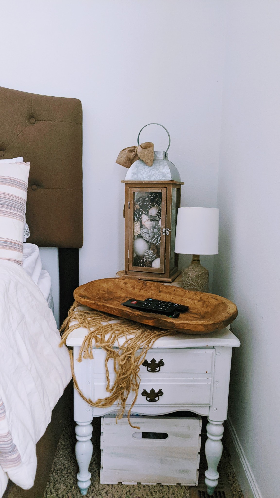 531 Pea Ridge Road Chestnut Mound, TN 38552 - Photo 62 of 91 a bed sitting in a bedroom next to a lamp