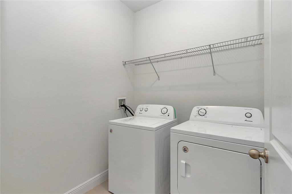 3650 Southwest 128th Place Ocala, FL 34473 - Photo 25 of 40 a utility room with dryer and washer