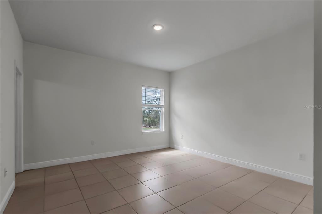 3650 Southwest 128th Place Ocala, FL 34473 - Photo 26 of 40 an empty room with windows