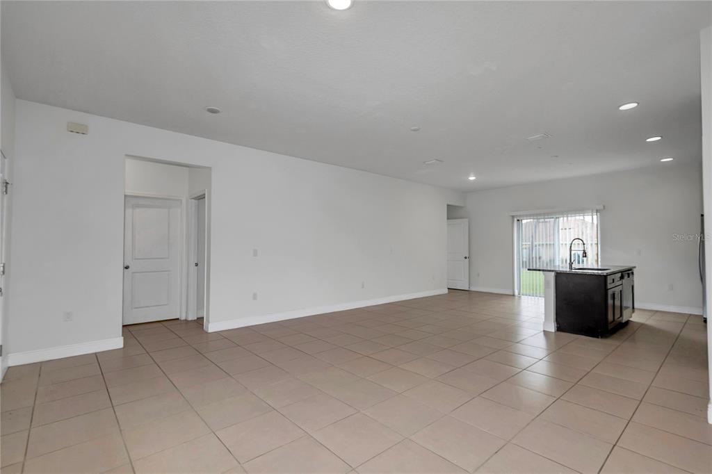 3650 Southwest 128th Place Ocala, FL 34473 - Photo 4 of 40 a view of empty room with wooden floor