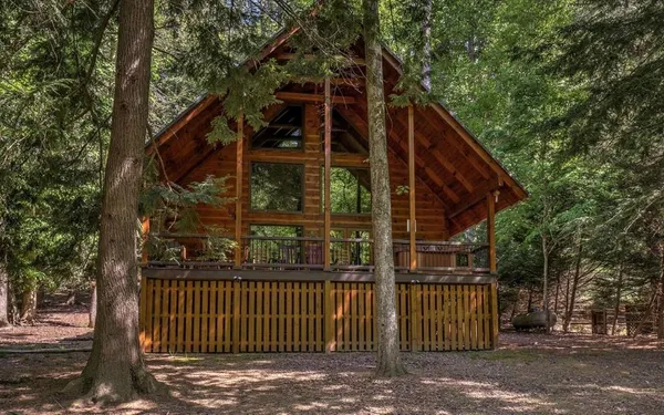 a view of a house with a small yard