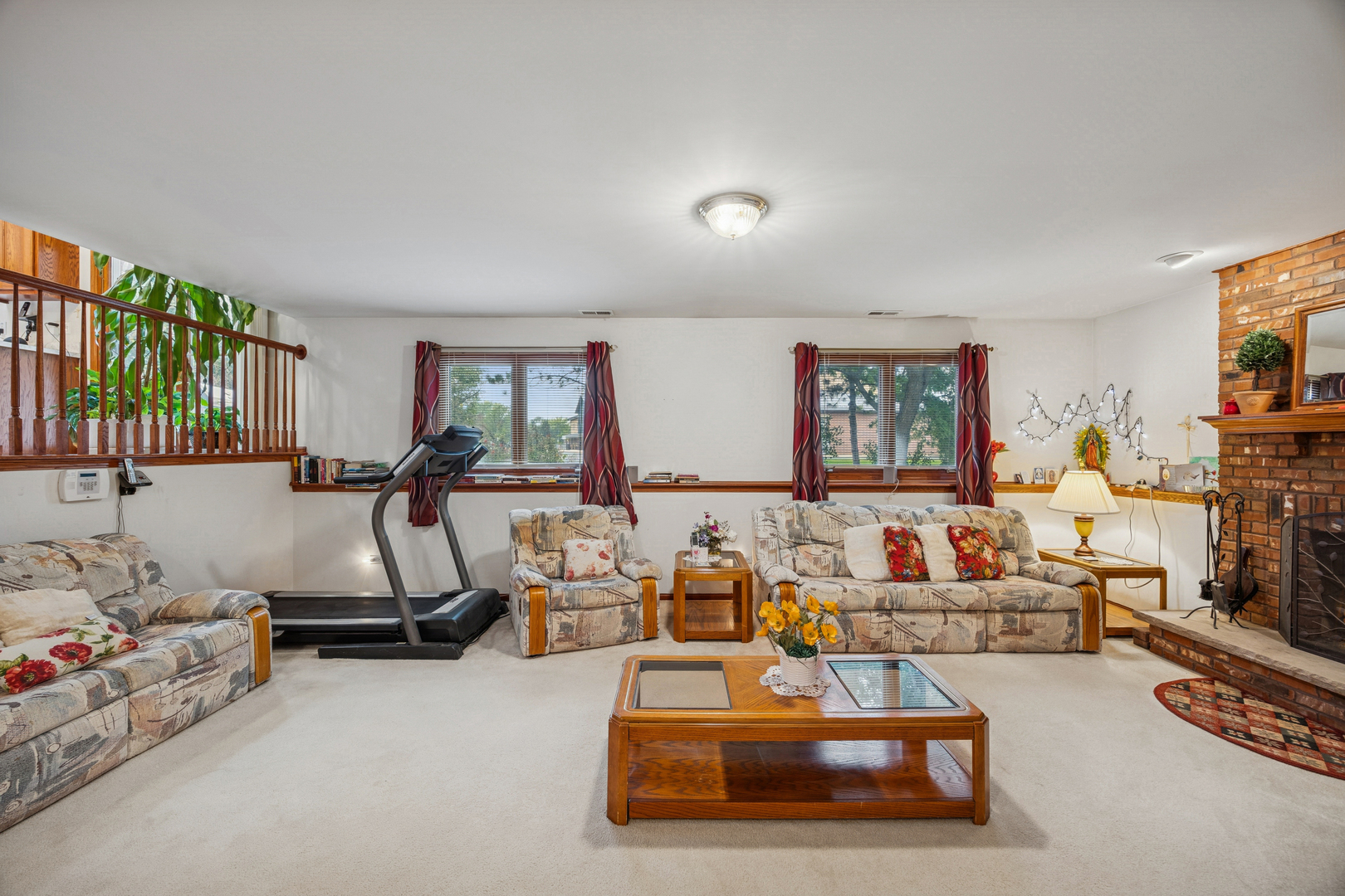 5524 Christopher Drive Oak Forest, IL 60452 - Photo 8 of 20 a room with gym equipment and a large window