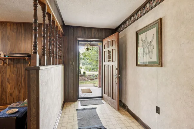 an entryway with a hardwood