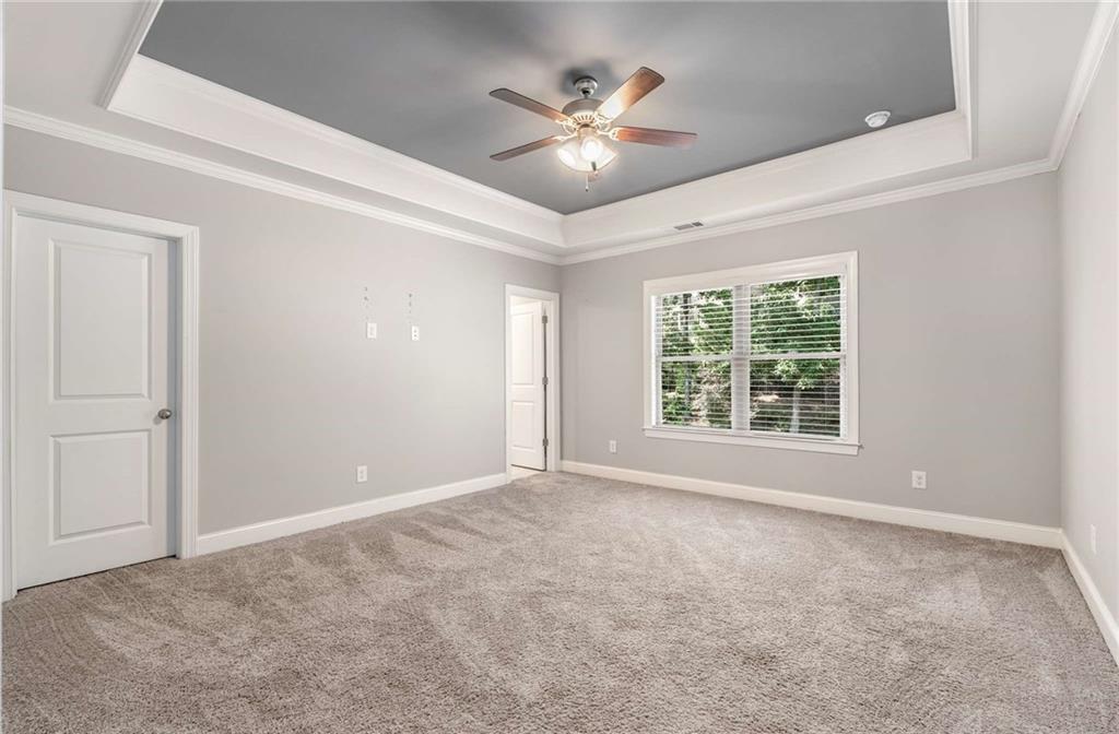5055 Pointer Ridge Flowery Branch, GA 30542 - Photo 47 of 86 a view of an empty room with a window