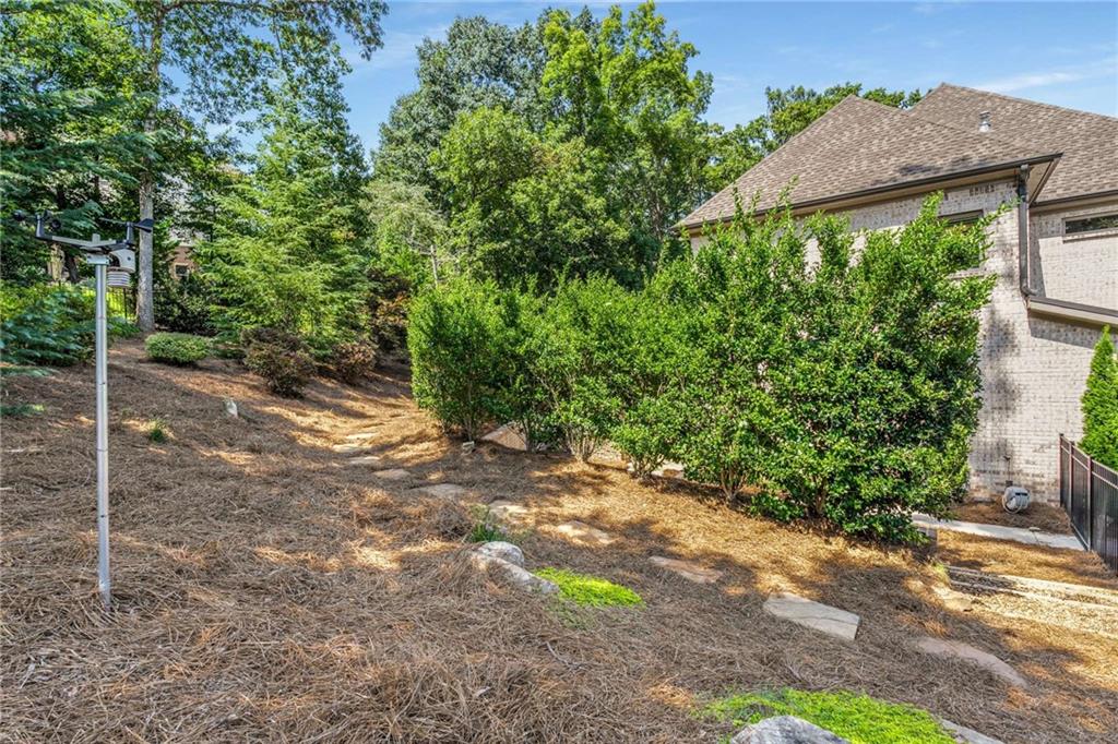5055 Pointer Ridge Flowery Branch, GA 30542 - Photo 57 of 79 a view of a house with a yard