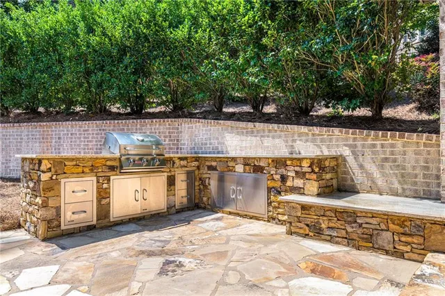 a view of a dining room with furniture wooden floor and chandelier