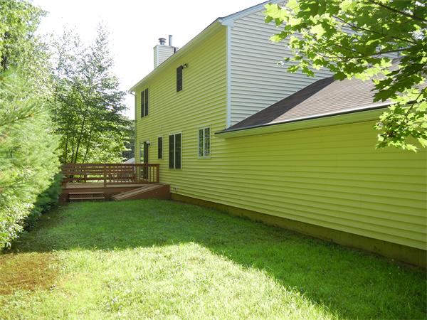 42 Clark Road Sturbridge, MA 01518 - Photo 4 of 19 a view of a backyard with a garden