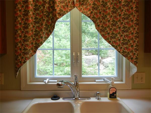 42 Clark Road Sturbridge, MA 01518 - Photo 7 of 19 a bathroom with a sink and a large window