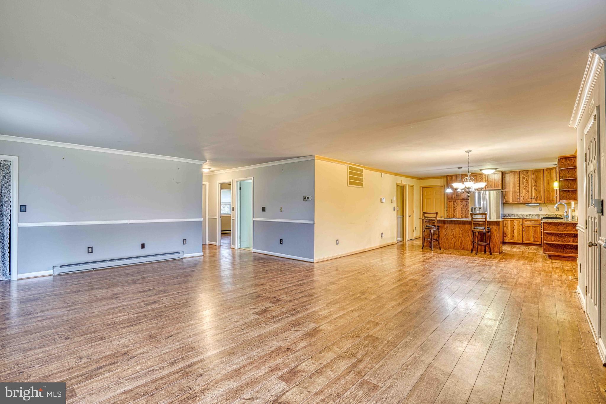 14957 Cherry Lane Ridgely, MD 21660 - Photo 17 of 66 a view of a livingroom with wooden floor