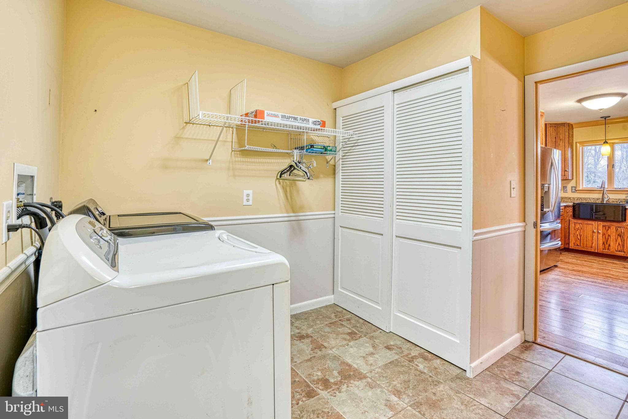14957 Cherry Lane Ridgely, MD 21660 - Photo 20 of 66 a utility room with dryer and washer