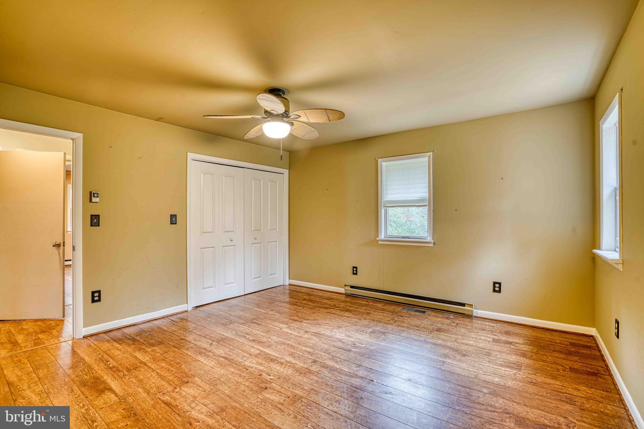 14957 Cherry Lane Ridgely, MD 21660 - Photo 24 of 66 wooden floor in an empty room with a window