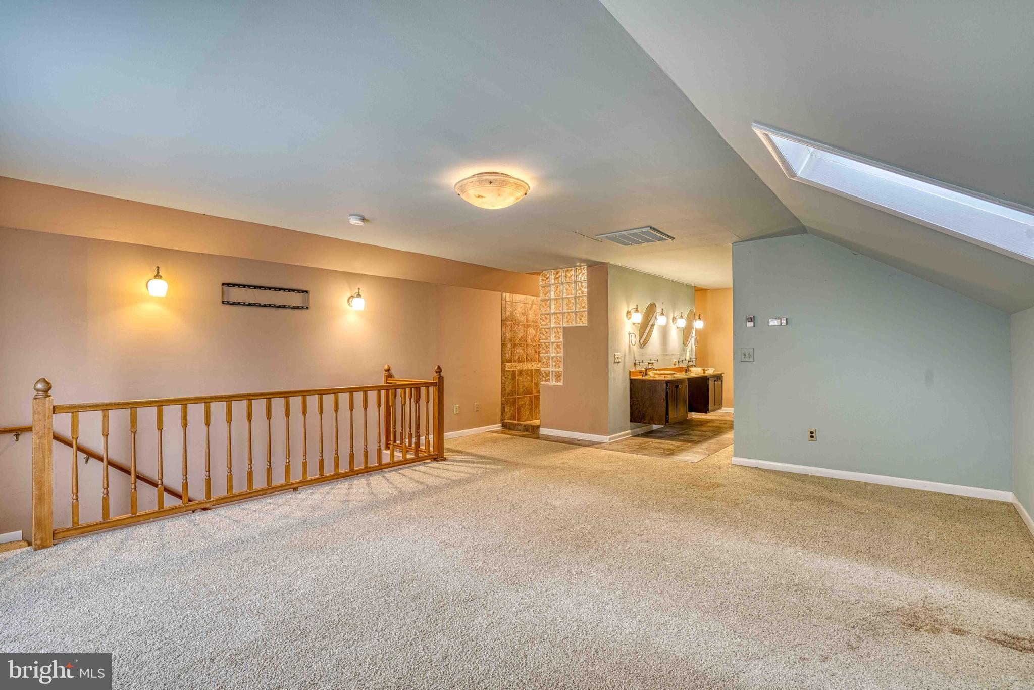 14957 Cherry Lane Ridgely, MD 21660 - Photo 37 of 66 a view of an empty room with window and stairs
