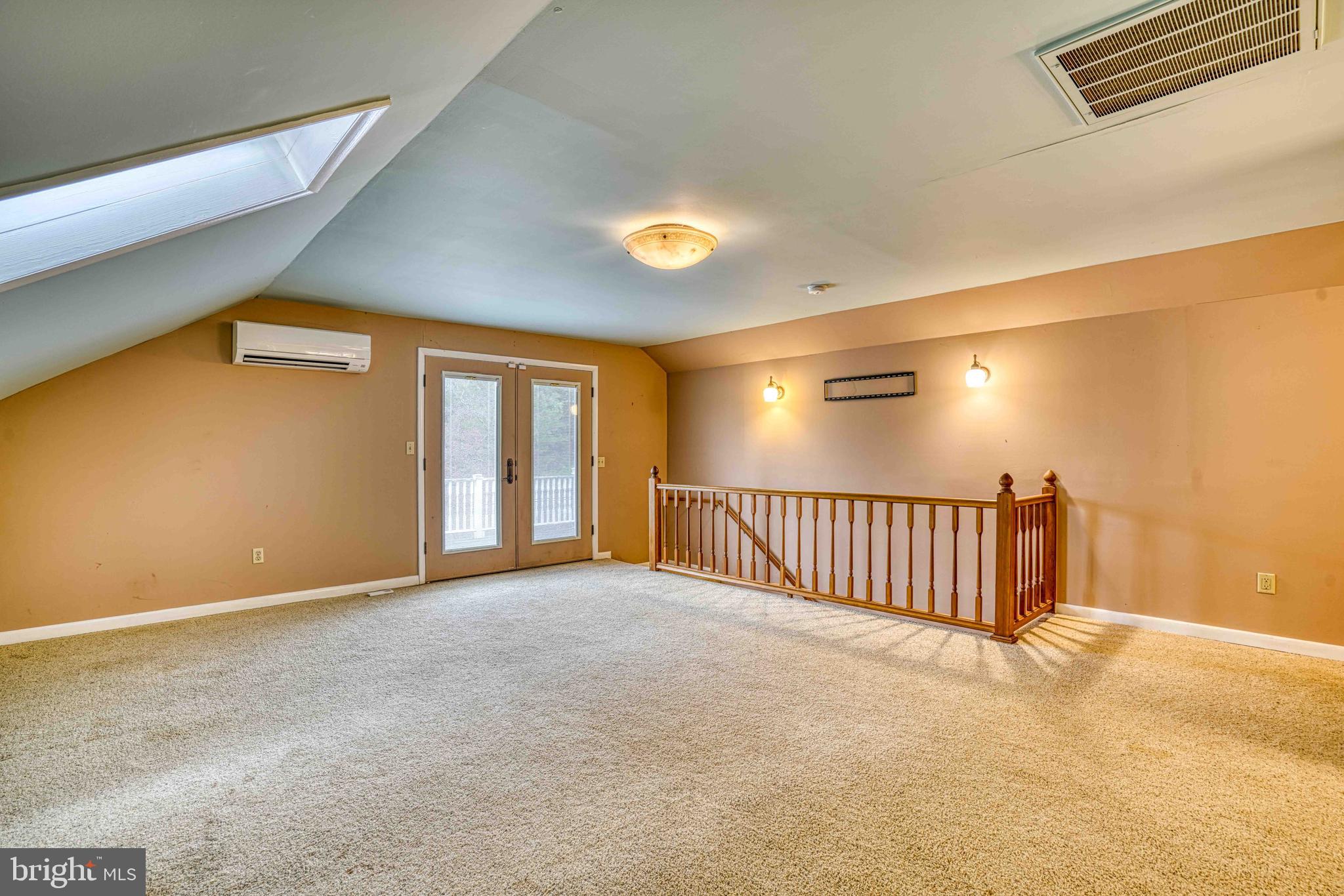 14957 Cherry Lane Ridgely, MD 21660 - Photo 38 of 66 a view of a livingroom with a staircase