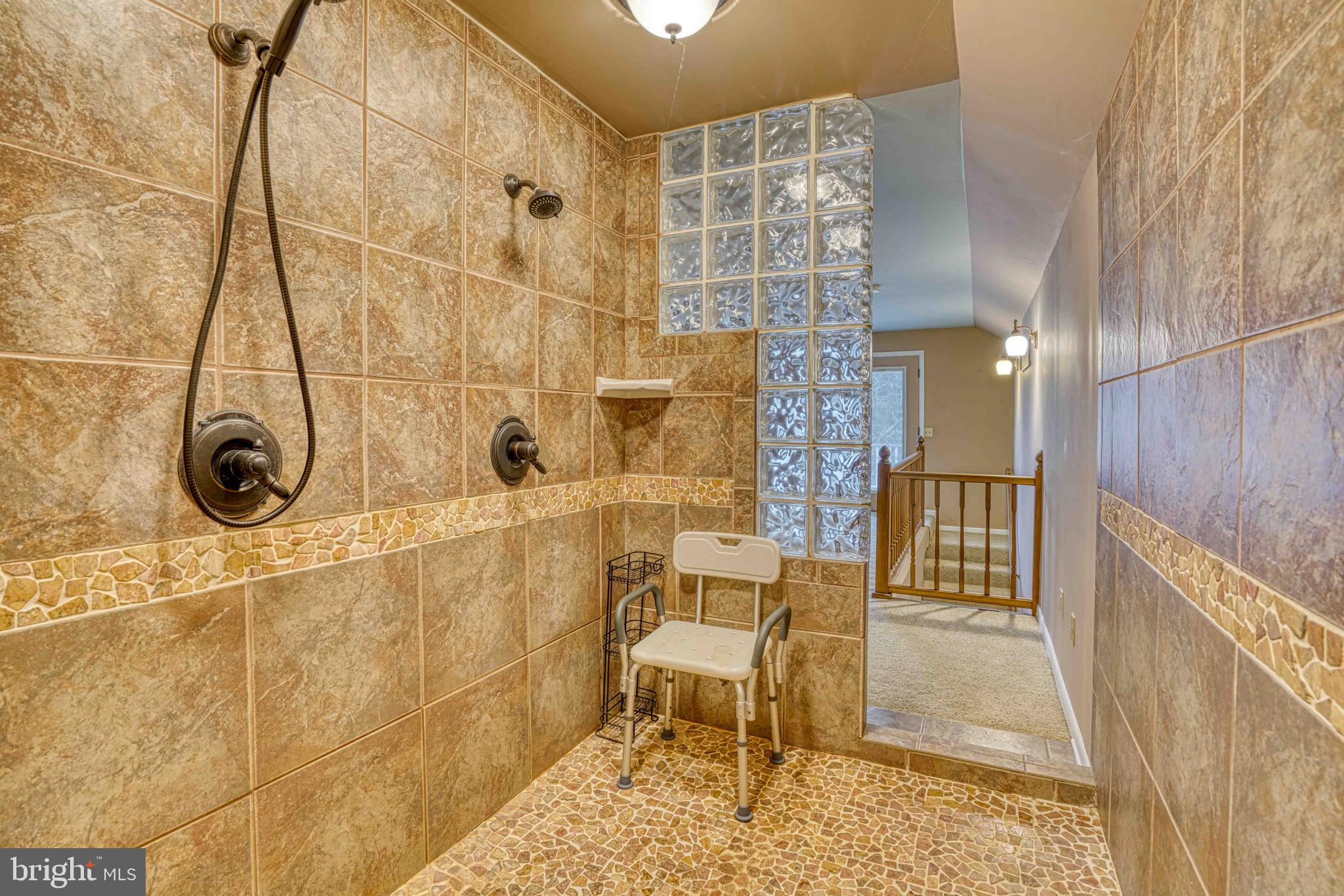 14957 Cherry Lane Ridgely, MD 21660 - Photo 42 of 66 a bathroom with a sink and mirror