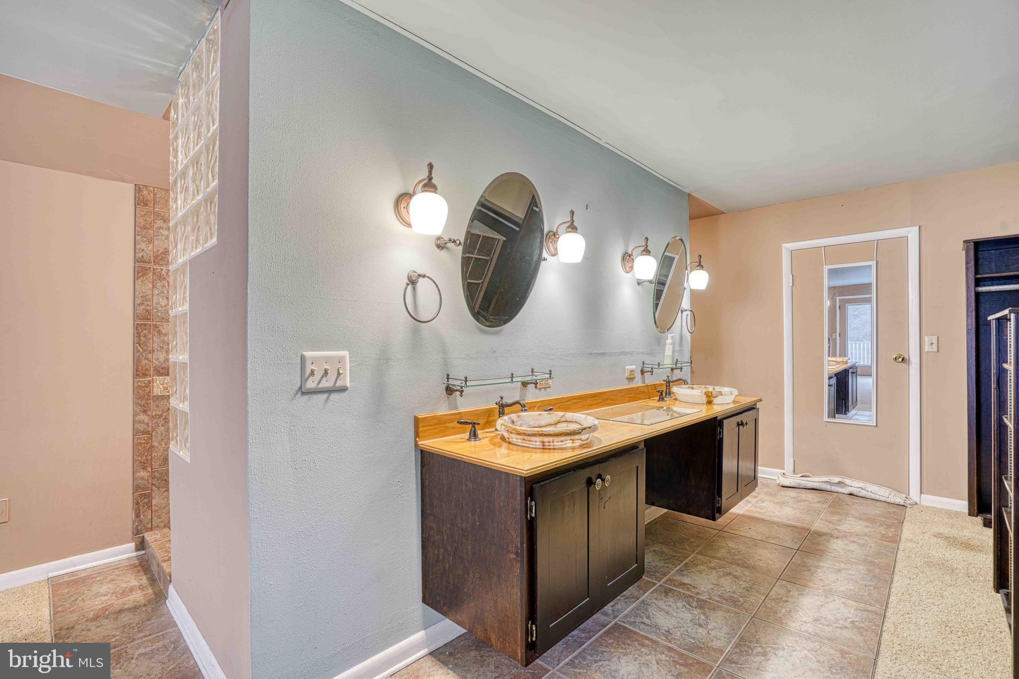 14957 Cherry Lane Ridgely, MD 21660 - Photo 46 of 66 a room with stainless steel appliances granite countertop a sink and a refrigerator