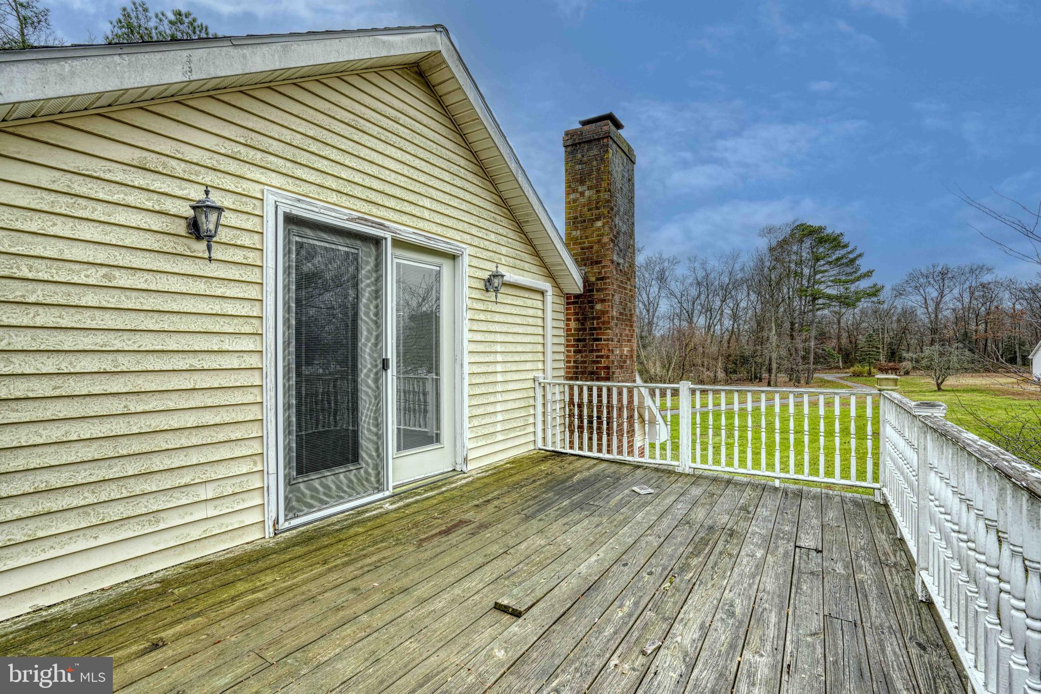 14957 Cherry Lane Ridgely, MD 21660 - Photo 48 of 66 a view of a house with a roof deck