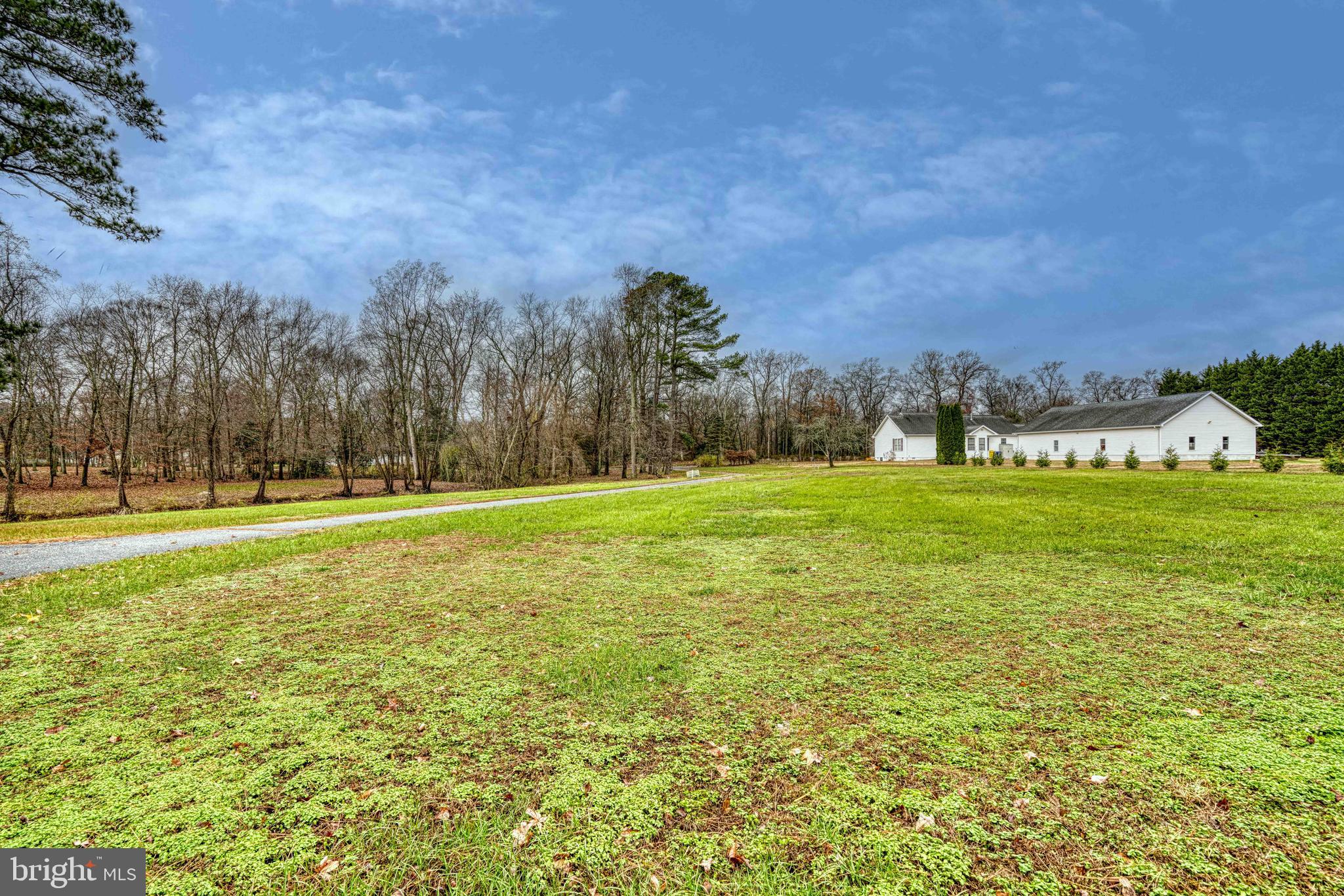 14957 Cherry Lane Ridgely, MD 21660 - Photo 53 of 66 a view of a playground with basketball court