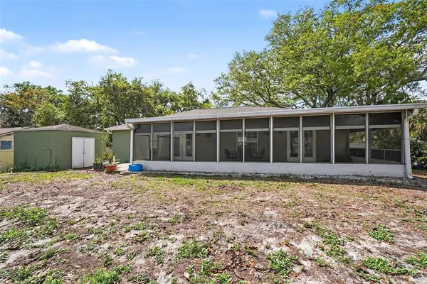 a view of a house with a window and garden