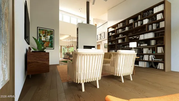 a view of hall way with furniture and staircase