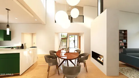 a dining room with furniture and wooden floor