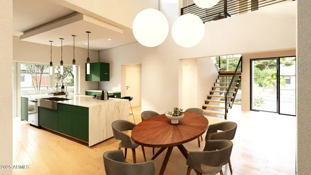 a living room with furniture a large window and a dining table