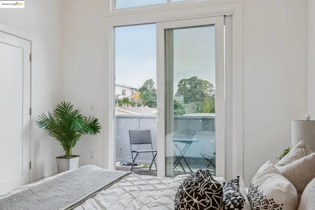 a terrace of a house with outdoor seating